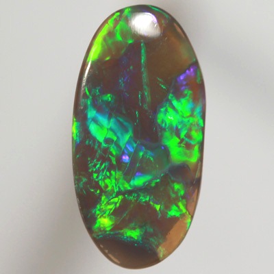 SOLID BLACK CRYSTAL OPAL Rolling flashes of golden green